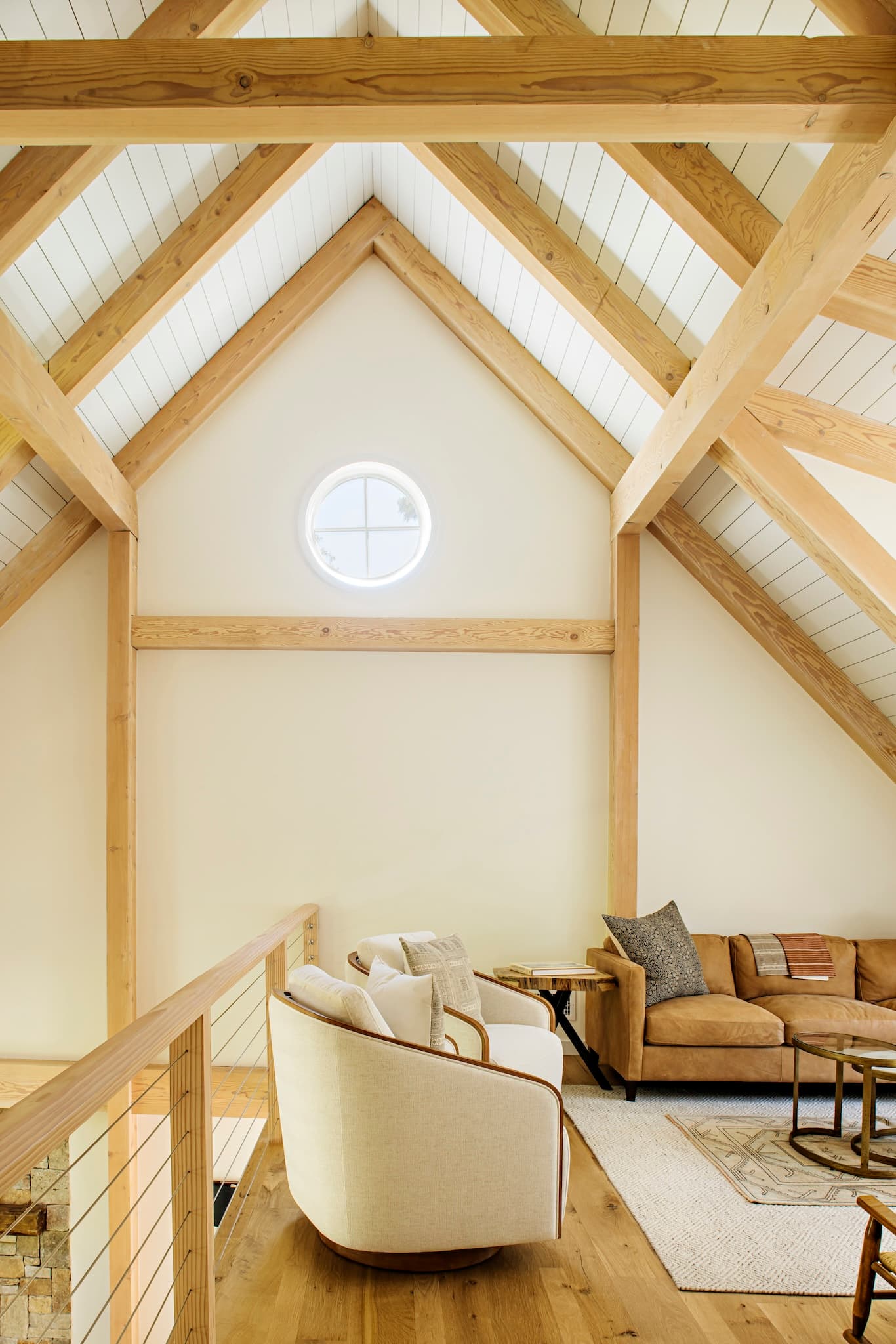Vaulted ceilings and exposed rafters create a sense of space with expert craftmanship